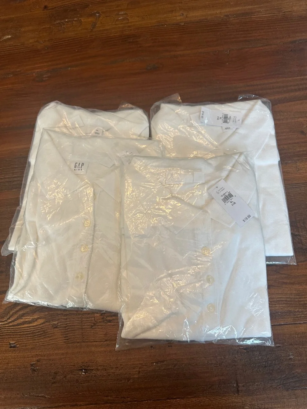 4 White Kids uniform polos unisex with tags